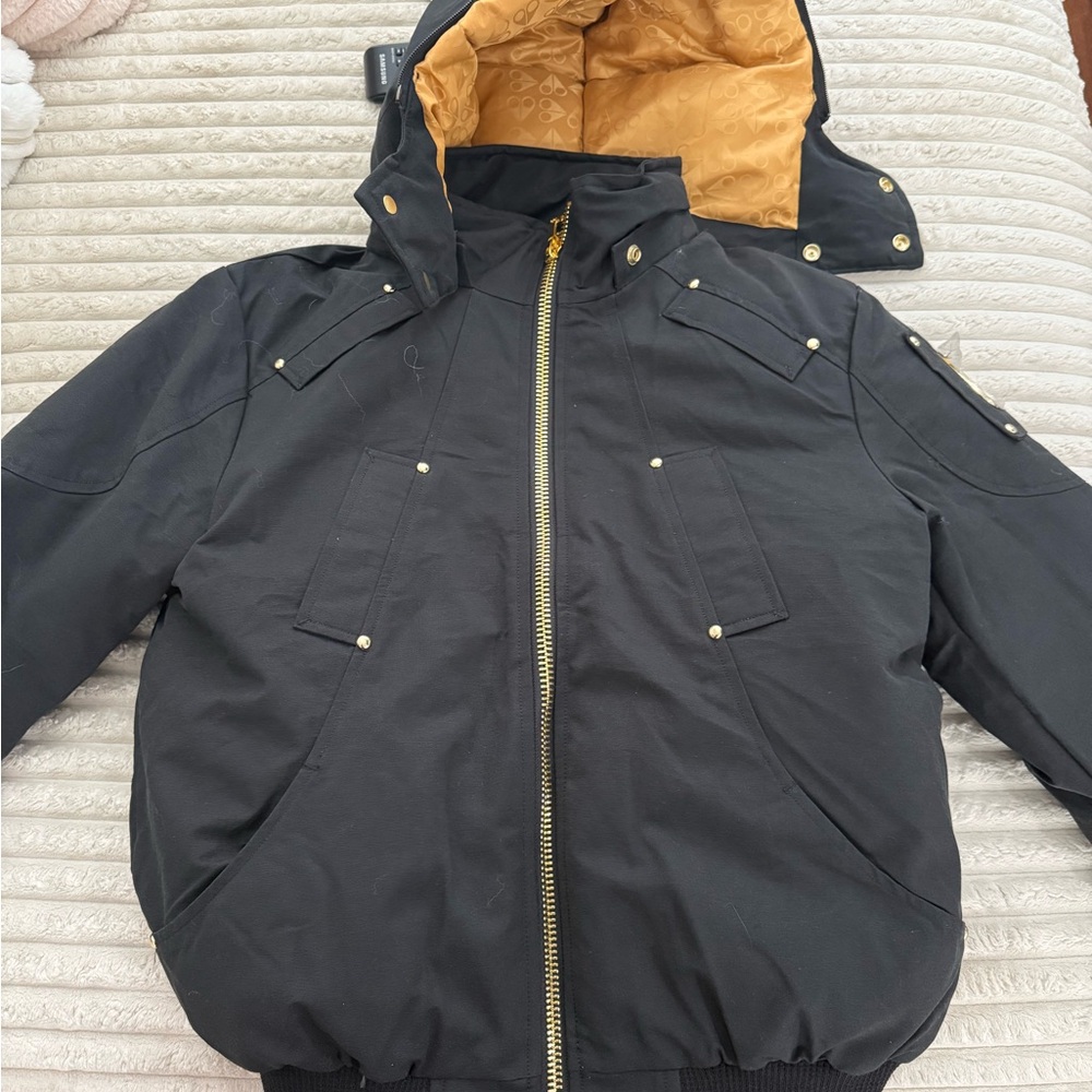 Moose Knuckles Black and Gold Puffer Jacket